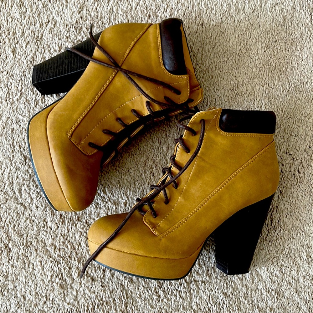 Tan and brown heeled boots